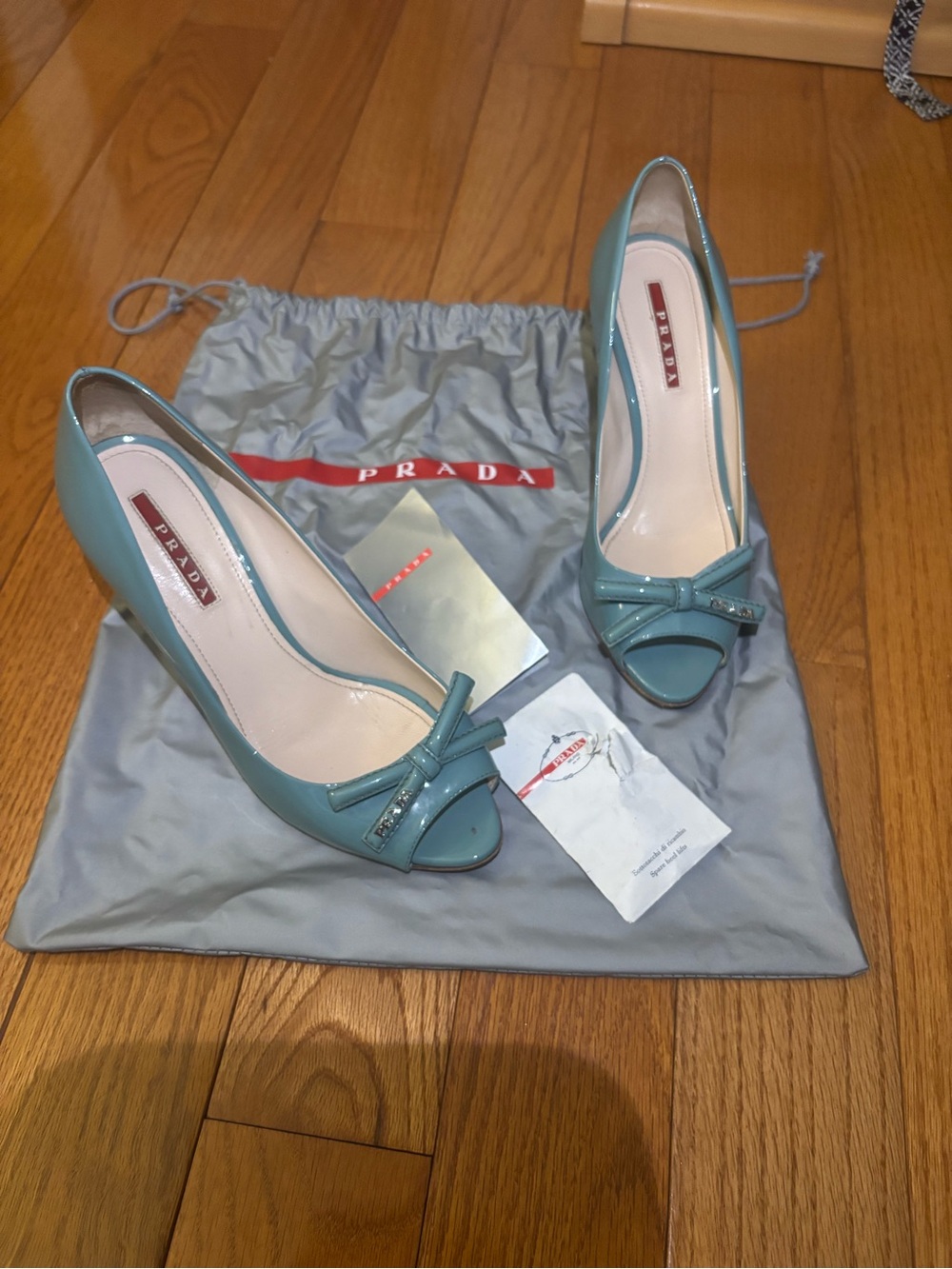 Prada Aqua Patent Leather Peep-Toe Pumps with Bow